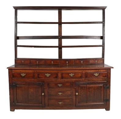 Lot 778 - {} A Mid 18th Century Enclosed Dresser and...