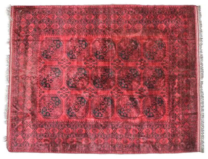 Lot 510 - Afghan Ersari Carpet, circa 1970 The claret...