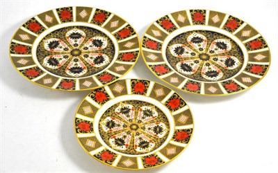 Lot 161 - Two large Royal Crown Derby plates and a smaller example (3)