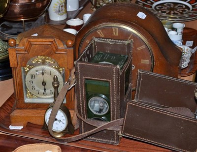 Lot 163 - A racing pigeon clock, two mantel clocks, a Swiza alarm clock and a Gothic carved oak watch...