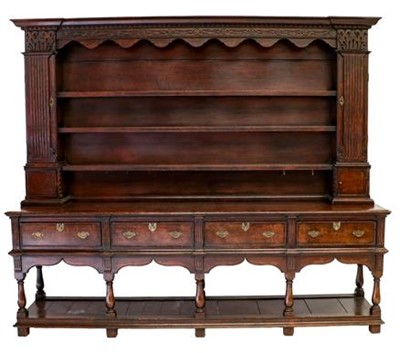 Lot 843 - A Reproduction Oak Dresser and Rack, in George...