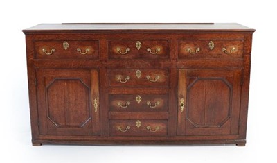 Lot 866 - A George III Oak Enclosed Dresser, late 18th...