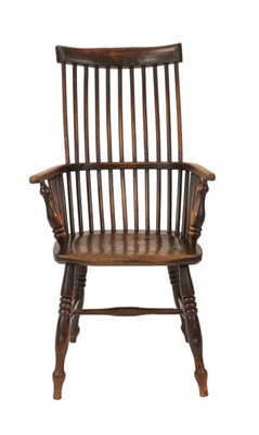 Lot 868 - A Mid 19th Century Ash and Elm Comb-Back...
