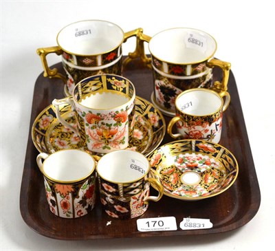 Lot 170 - Royal Crown Derby consisting of two loving cups, another two smaller loving cups, a coffee can...