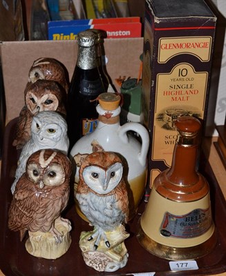 Lot 177 - A collection of assorted whisky including: five Peter Thomson owl decanters containing...