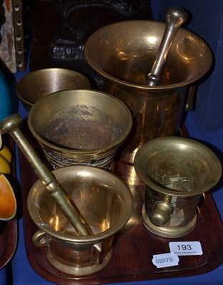 Lot 193 - Five copper and brass mortars and two pestles