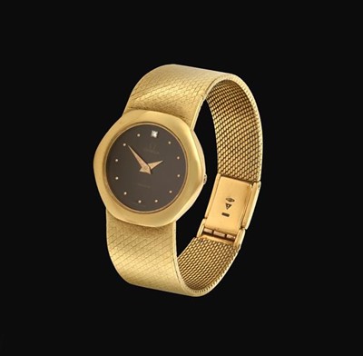 Lot 2121 - A Lady's 18 Carat Gold Wristwatch, signed...
