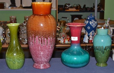 Lot 197 - Four Linthorpe pottery vases, shape No.477 (restored rim, 37cm), shape No.363, designed by...