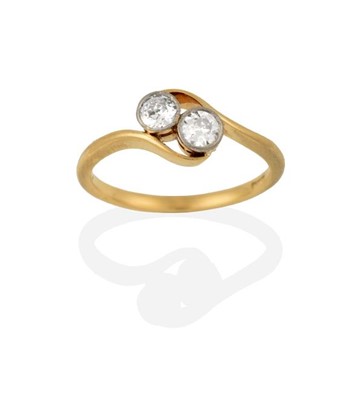Lot 2210 - A Diamond Two Stone Twist Ring, the round...