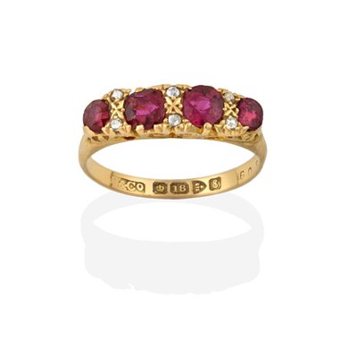 Lot 2211 - An 18 Carat Gold Ruby and Diamond Ring, four...