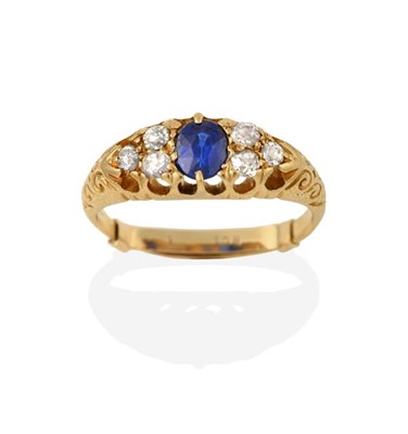 Lot 2213 - A Sapphire and Diamond Ring, the oval cut...