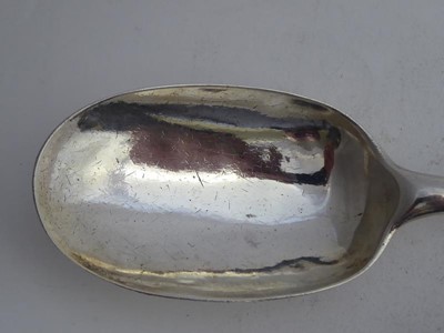 Lot 2023 - A George I Silver Hash-Spoon, Maker's Mark...