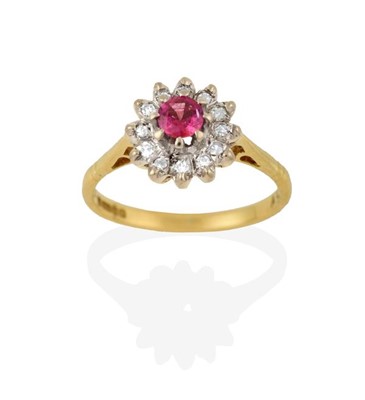 Lot 2220 - An 18 Carat Gold Pink Sapphire and Diamond...