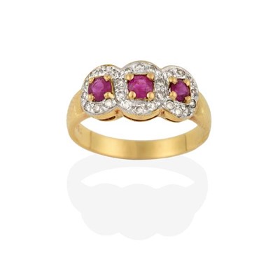 Lot 2221 - A Ruby and Diamond Triple Cluster Ring, the...