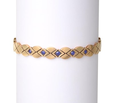Lot 2255 - A Synthetic Sapphire Bracelet, the geometric...