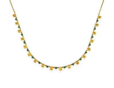 Lot 2262 - A Synthetic Yellow Sapphire and Emerald...
