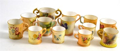 Lot 210 - Various miniature Royal Worcester blush ivory cups and loving cups, a miniature Hadley ware...