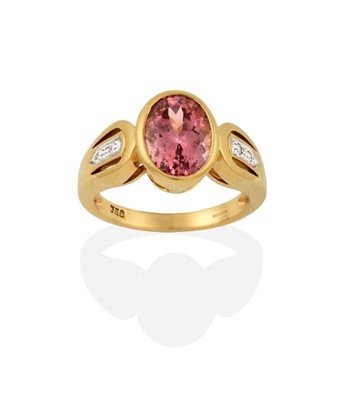 Lot 2279 - An 18 Carat Gold Garnet and Diamond Ring, the...