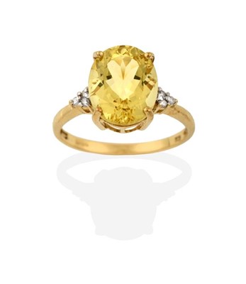 Lot 2282 - A 9 Carat Gold Heliodor Beryl and Diamond Ring,...