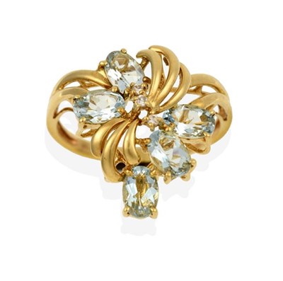 Lot 2288 - A 9 Carat Gold Aquamarine Ring, the floral...