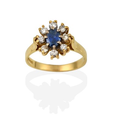 Lot 2294 - An 18 Carat Gold Sapphire and Diamond Cluster...
