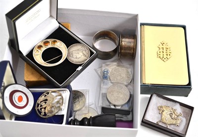 Lot 217 - Two Shetland Silvercraft brooches, two other Scottish brooches, another, two silver napkin rings, a