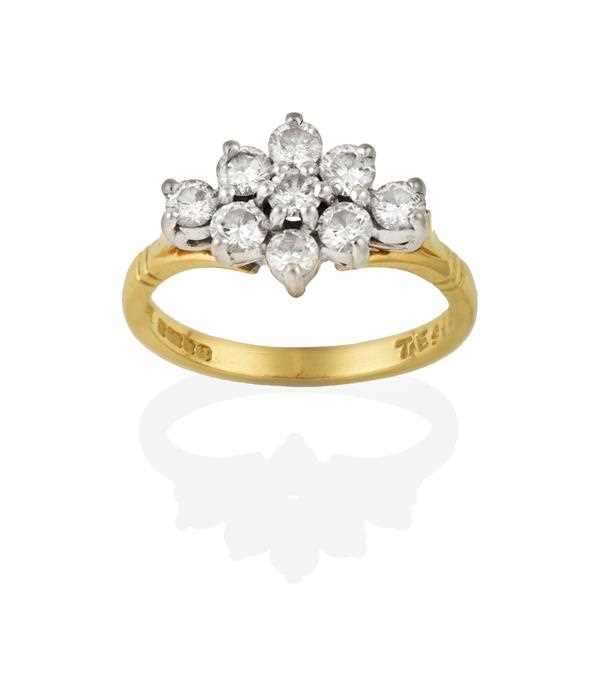Lot 2350 - An 18 Carat Gold Diamond Cluster Ring, the...