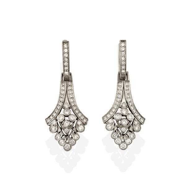Lot 2356 - A Pair of Diamond Drop Earrings, each tapering...