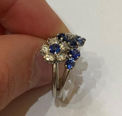 Lot 2359 - A Sapphire and Diamond Cluster Ring,...