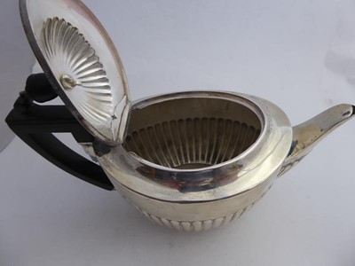 Lot 2040 - A Four-Piece Victorian Silver Tea and...