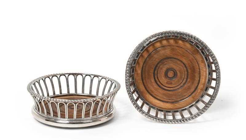 Lot 2053 - A Pair Silver Plate Wine-Coasters, Apparently...