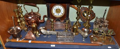 Lot 231 - A shelf including an oak mantel clock, a carved oak hand mirror, postal scales, a plated cruet,...