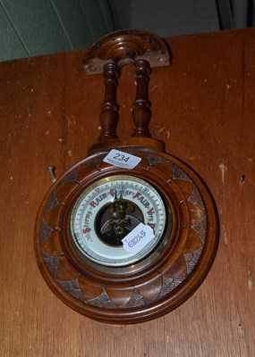 Lot 234 - Wheel barometer