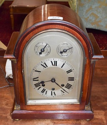 Lot 373 - An Edwardian mahogany chiming mantle clock,...