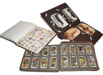 Lot 181 - An album of crests, two cigarette card albums...