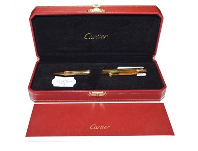 Lot 236 - A boxed Cartier pen
