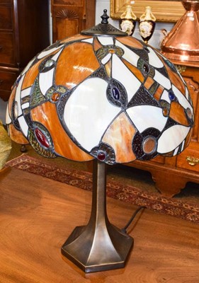 Lot 365 - A Tiffany style table lamp, the shade...