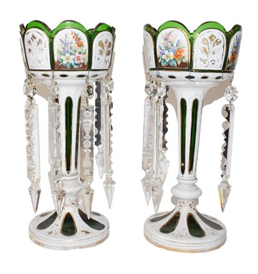 Lot 115 - A pair of Bohemian green glass table lustres,...