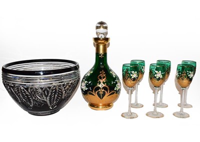 Lot 138 - A Murano emerald glass liqueur set with gilt...
