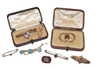 Lot 258 - A 9 carat gold ruby and split pearl brooch,...