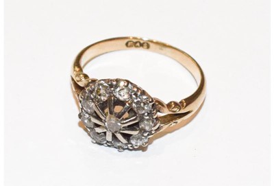 Lot 261 - A diamond cluster ring, finger size M
