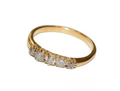 Lot 276 - A diamond five stone ring, finger size Q1/2
