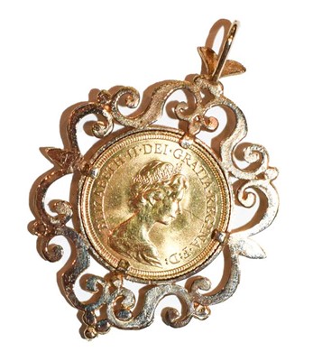 Lot 383 - A sovereign dated 1974 mounted as a pendant,...