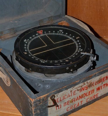 Lot 270 - A Second World War air Ministry type P10 compass, No. 28307 B, in grey painted wood carrying case