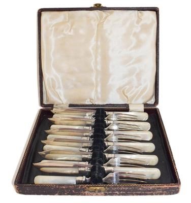 Lot 386 - A set of silver bladed and mother of pearl...