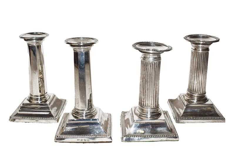 Lot 95 - Two Pairs of Edward VII Silver Candlesticks,...