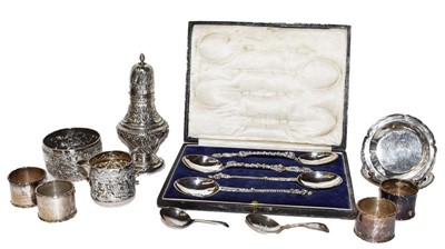 Lot 125 - A tray of assorted silver including: a sugar...
