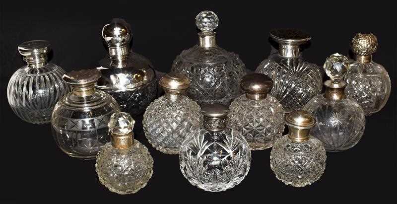 Lot 148 - A collection of various silver-mounted glass...