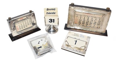 Lot 183 - Five various silver-mounted desk-calendars (5)