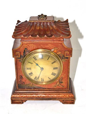 Lot 278 - A 1930's small pagoda shaped mantel clock in a japanned case